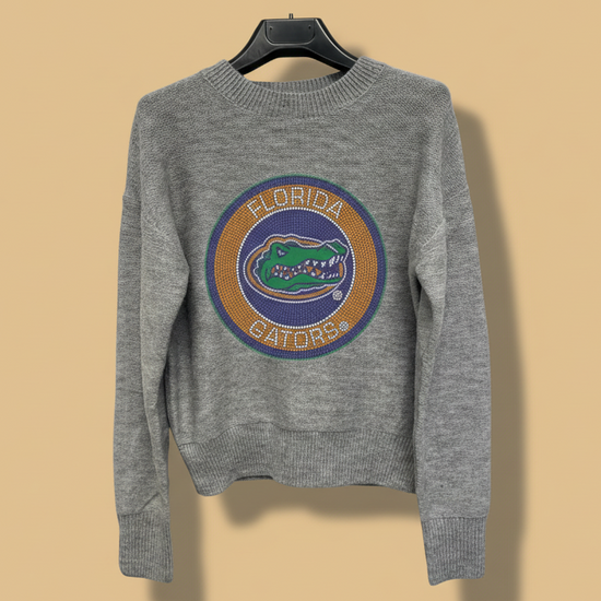Gray sweater with Florida Gators logo on a hanger