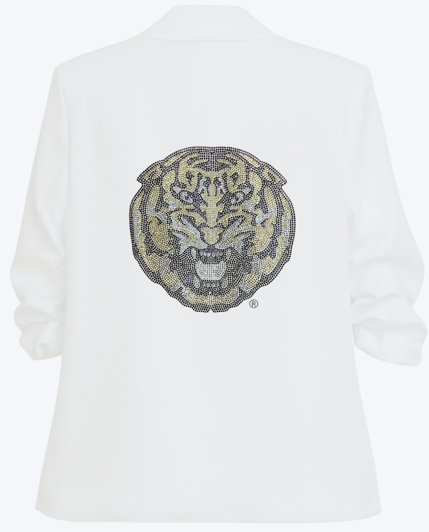 White blazer with a tiger face design made of black beads on a white background