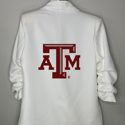 White shirt with a red &