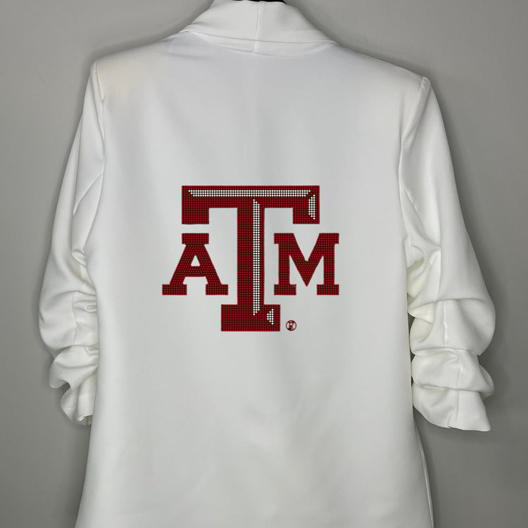 White shirt with a red &