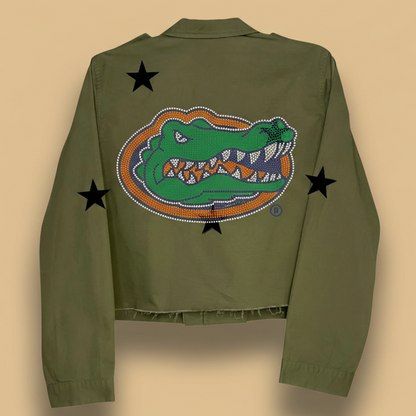 Green jacket with a gator logo and stars on a white background
