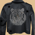 Black jacket with a tiger design and star patterns on a white background