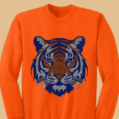 Orange sweatshirt with a tiger face design on a white background