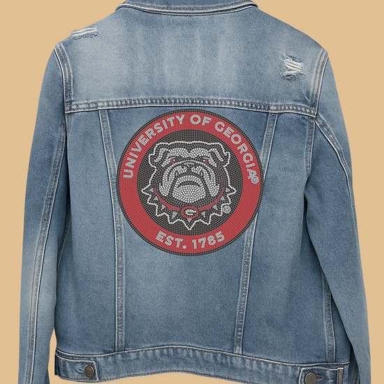 Blue denim jacket with a University of Georgia patch on a white background