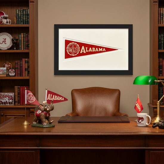 Framed red and white Vintage University of Alabama Hormel Pennant with black frame on a white background