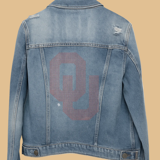 Blue denim jacket with a large &