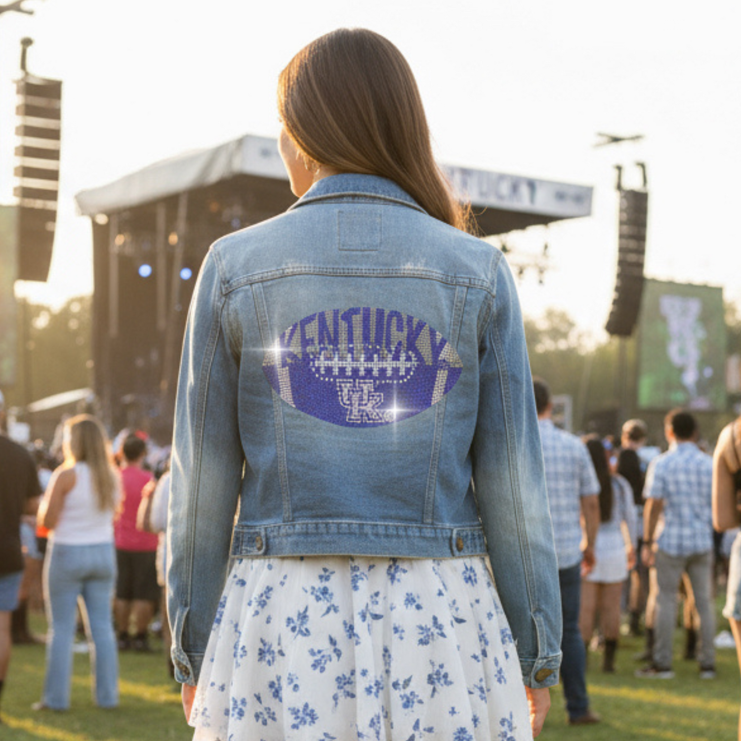 Person wearing a denim jacket with &