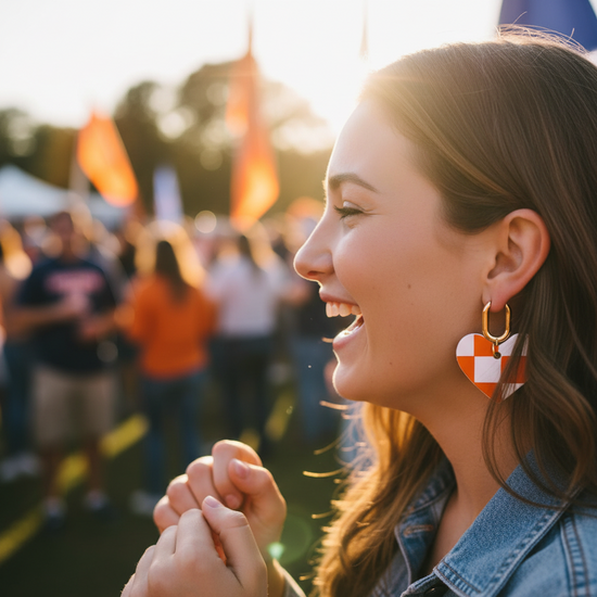 Heart-shaped checkered earrings on a beige background