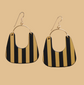 Black and gold striped earrings on a light gray background