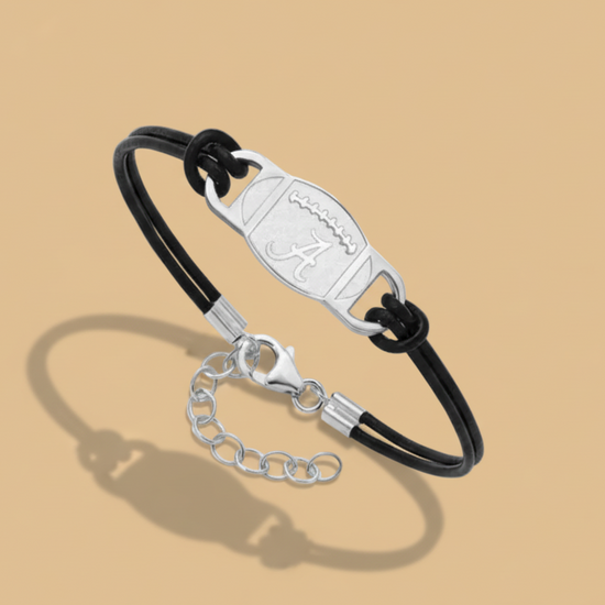 Black leather bracelet with silver clasp on a white background