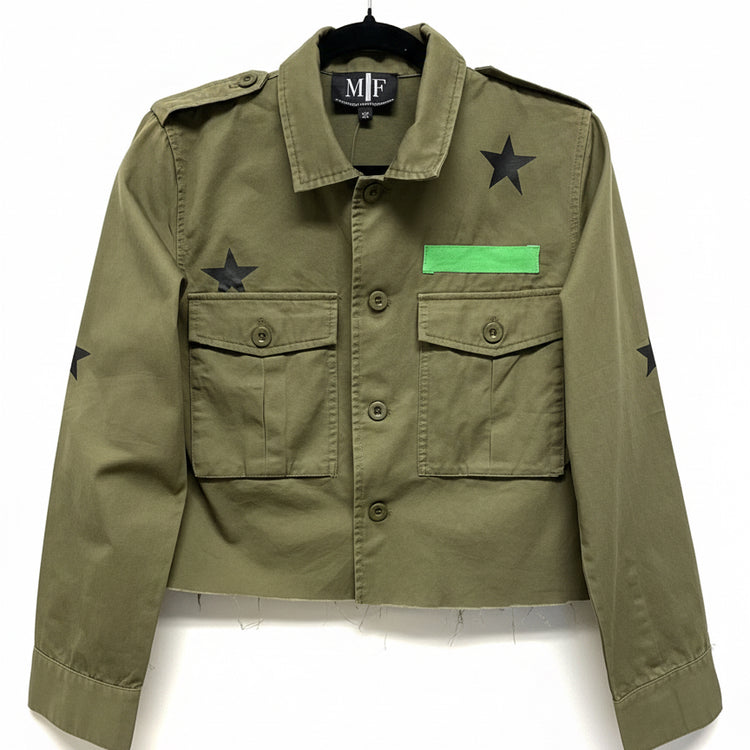 Green jacket with star patterns on a beige background