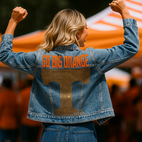 Person wearing a denim jacket with &