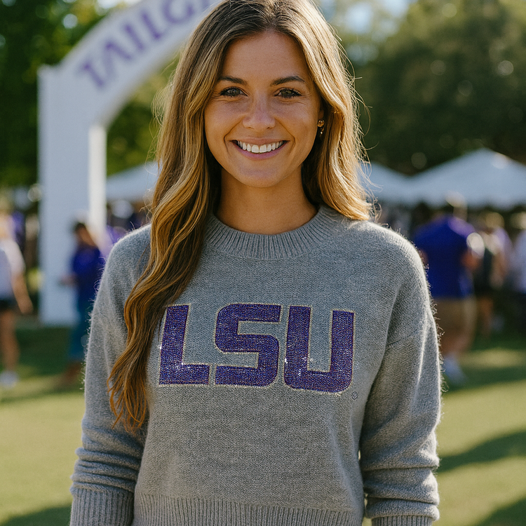 Woman wearing a LSU sweater at a tailgate event