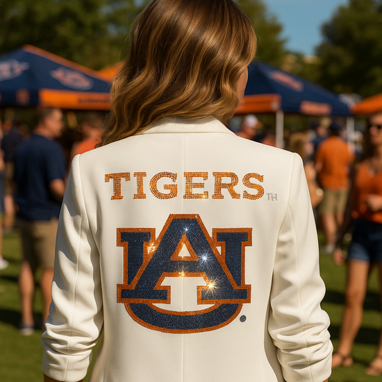 Person wearing a white jacket with &