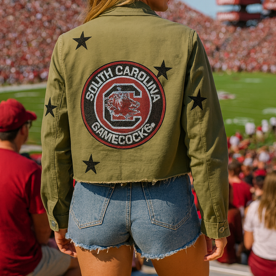 Person wearing a South Carolina Gamecocks jacket at a sports event
