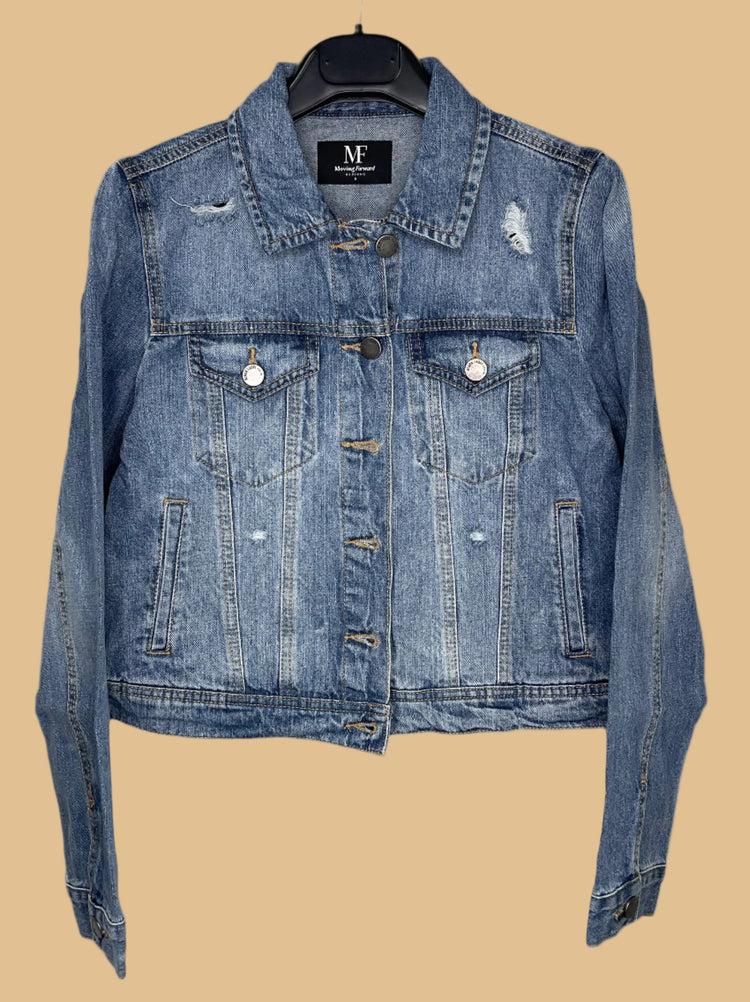Blue denim jacket on a hanger with a visible brand label against a white background