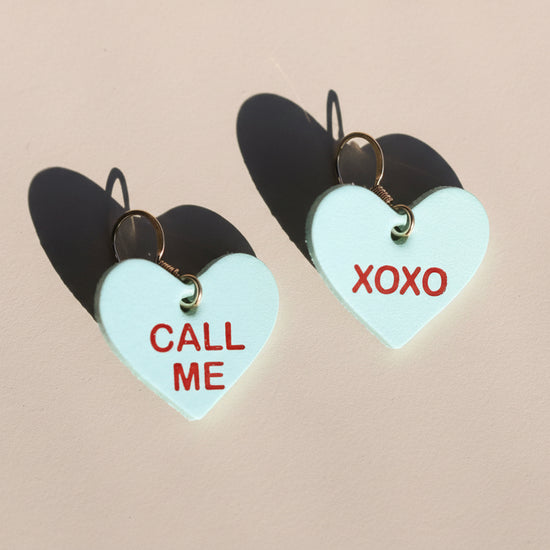 Heart-shaped earrings with &