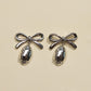 Silver Football & Bow Drop Studs